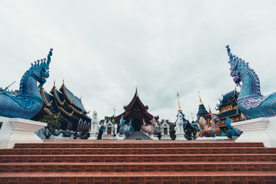 Low angle view of statue against sky