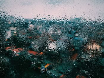 Close-up of water drops on glass