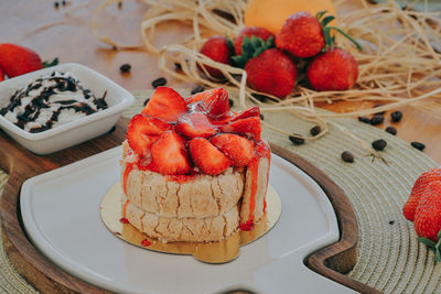 High angle view of strawberries in plate on table