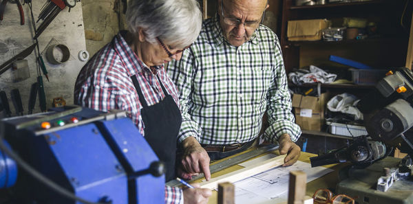 Carpenters working in workshop