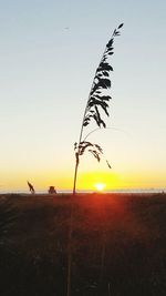 Scenic view of sea against sky at sunset