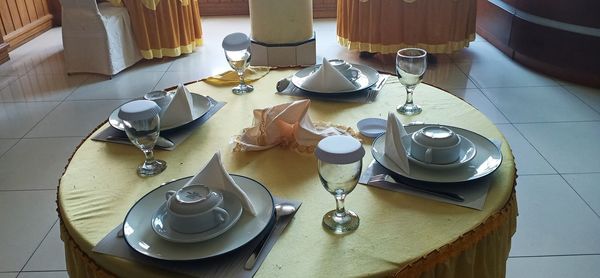 High angle view of wine glasses on table