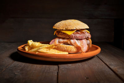 Close-up of burger in plate on table