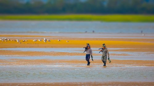 People walking at beach