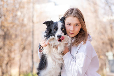 Portrait of woman with dog