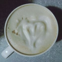 Close-up of cappuccino on table