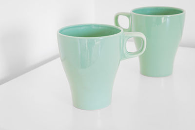 Close-up of coffee cup on table
