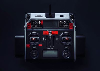 Close-up of camera over black background