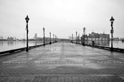 Street lights on footpath in city