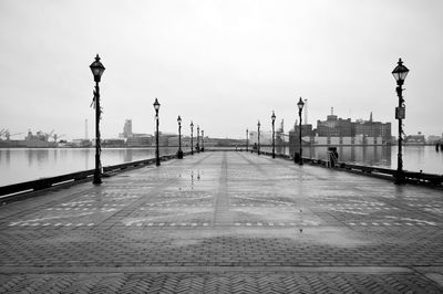 Street lights on footpath in city