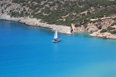 High angle view of sailboat sailing on sea