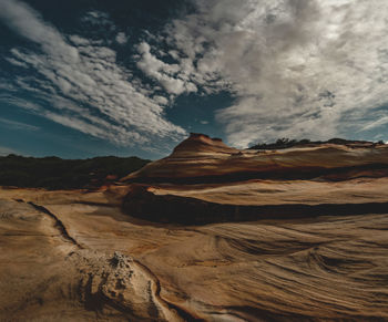 Scenic view of desert against sky