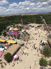 High angle view of crowd in city against sky