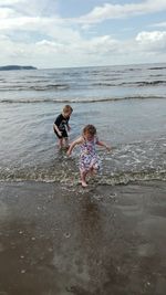 People enjoying at beach