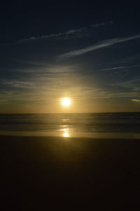 Scenic view of sea against sky at sunset