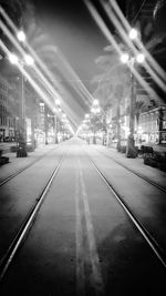 Illuminated street lights at night