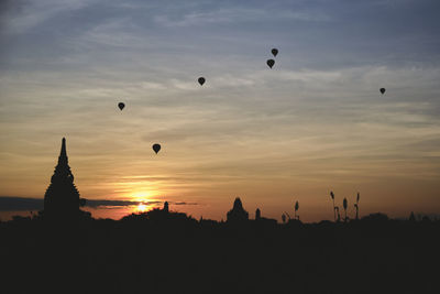 Hot air balloons during sunrise over the temples in bagan, myanmar