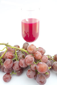 Close-up of fruits against white background