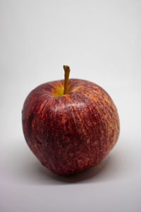 Close-up of apple against white background