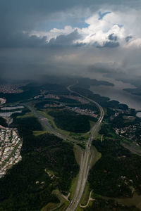 High angle view of road amidst landscape against sky