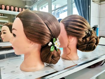 Rear view of woman with arms raised