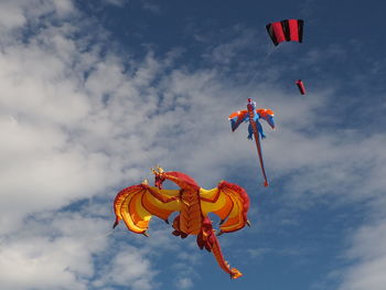 Low angle view of kite flying against sky