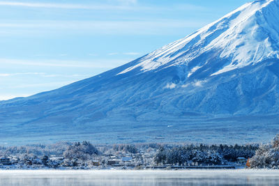 Scenic view of mountain against sky during winter