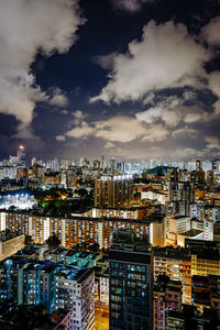 High angle view of city buildings at night