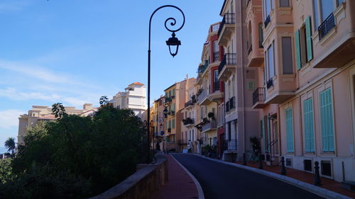 Road with buildings in background