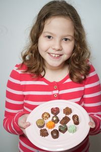 Portrait of smiling girl in plate