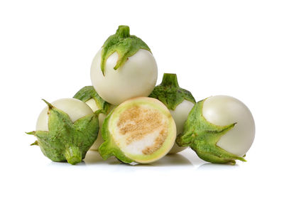 Close-up of fruits against white background