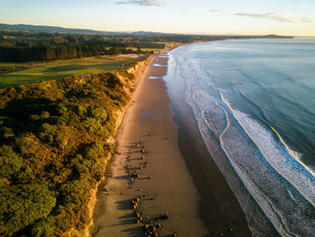 Aerial view of beach during sunset