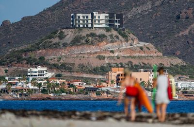 Tilt-shift image of buildings on beach