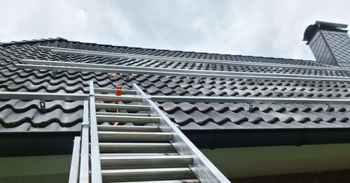 Low angle view of staircase of building against sky