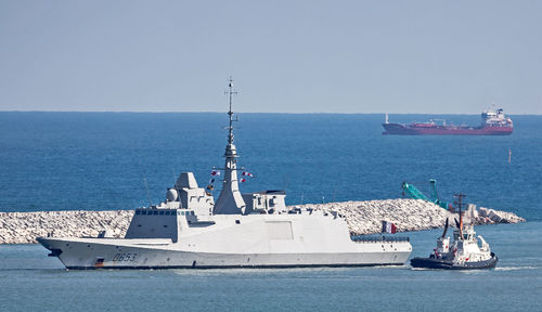 Nautical vessel on sea against sky