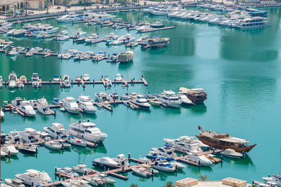 High angle view of boats moored in harbor