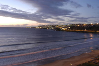 Scenic view of sea against sky at sunset