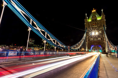 Light trails on bridge at night