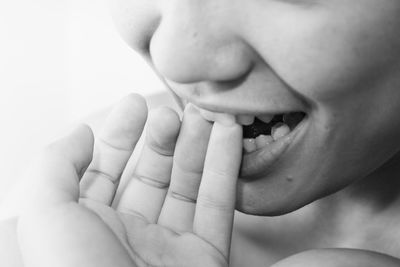 Close-up of boy with hands