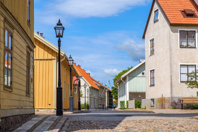 Idyllic old town hjo in sweden, with wooden houses and cobblestone street