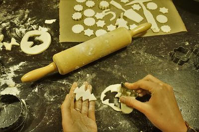 High angle view of person preparing food on table