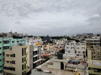 High angle view of buildings against sky