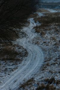 High angle view of snow covered road