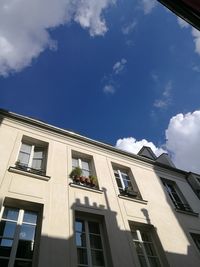 Low angle view of residential building against sky