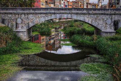 Arch bridge over river