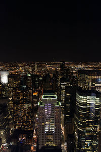 Illuminated cityscape at night