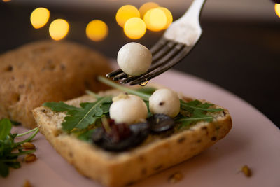 Close-up of fruits in plate on table