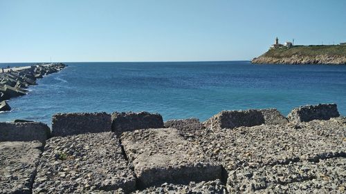 Scenic view of sea against clear sky