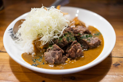 Close-up of meal served in bowl on table