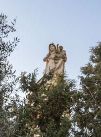 Low angle view of statue against clear sky